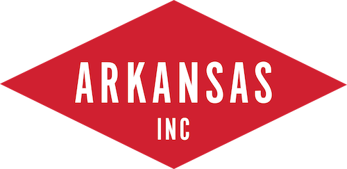 Red diamond-shaped logo with the word ARKANSAS in bold white capital letters and INC in smaller white capital letters below it, centered on a light background.
